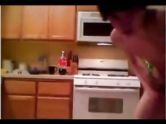 Teen guy is jerking off his cock in the kitchen