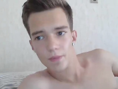 Handsome guy with pierced ear is watching twink fuck