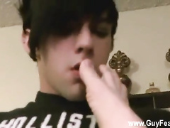 Emo fetishist is smelling gay feet and masturbating dick