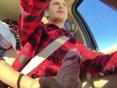 Young handsome twinks are jerking off in the car while driving
