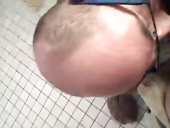 Bald hunk with glasses gets filmed in gay blowjob POV porn video